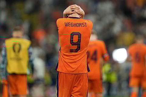 Wout Weghorst reacts after a semifinal match against England